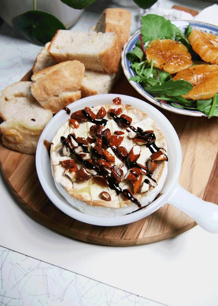 Baked brie with bread and salad
